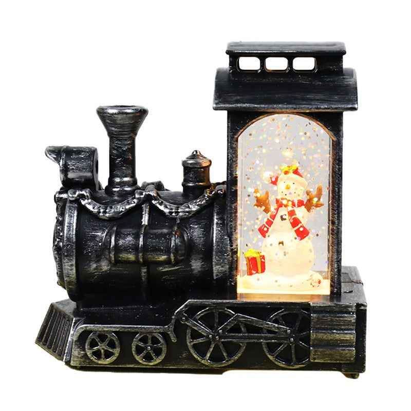 Decoratiune de Craciun tip Locomotiva, Flippy, Glob de Cristal cu Fulgi de Zapada, Model Om de Zapada, Iluminare LED, 11.5 x 12.5 x 6 cm, Carcasa Vintage Bronze, Transparent