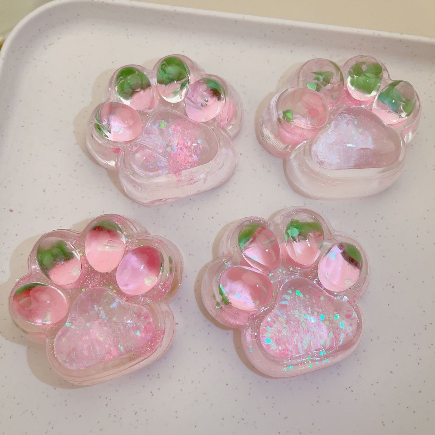 Jucarie Antistres Squishy, Flippy, cu Revenire Lenta, Squeeze Pinch Family, Model Labuta de Pisica cu Sclipici, 6.5x6 cm, 60g, Ambalaj Transparent, Roz