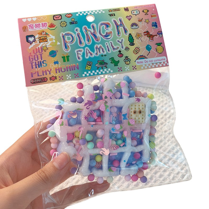 Jucarie Antistres Squishy, Flippy, cu Revenire Lenta, Squeeze Pinch Family, Model Waffle, 6x6 cm, 99g, Ambalaj Transparent, Multicolor