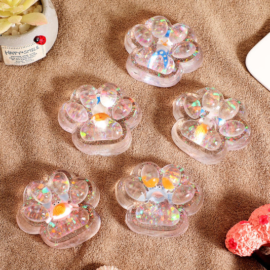 Jucarie Antistres Squishy, Flippy, cu Revenire Lenta, Squeeze Pinch Family, Model Cat Paw, 6.5 x 7 cm, din Tpr, 4-6 Ani, Model 6 Ocean, Transparent